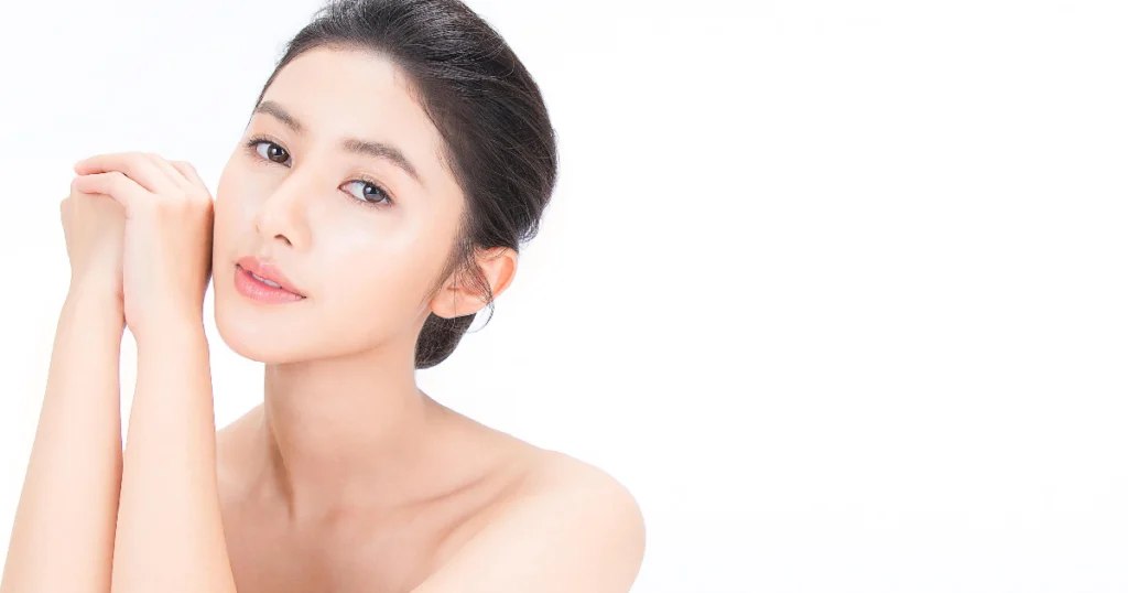 Woman showing smooth, glowing skin after SaltFacial™ Treatments in Tampa, FL